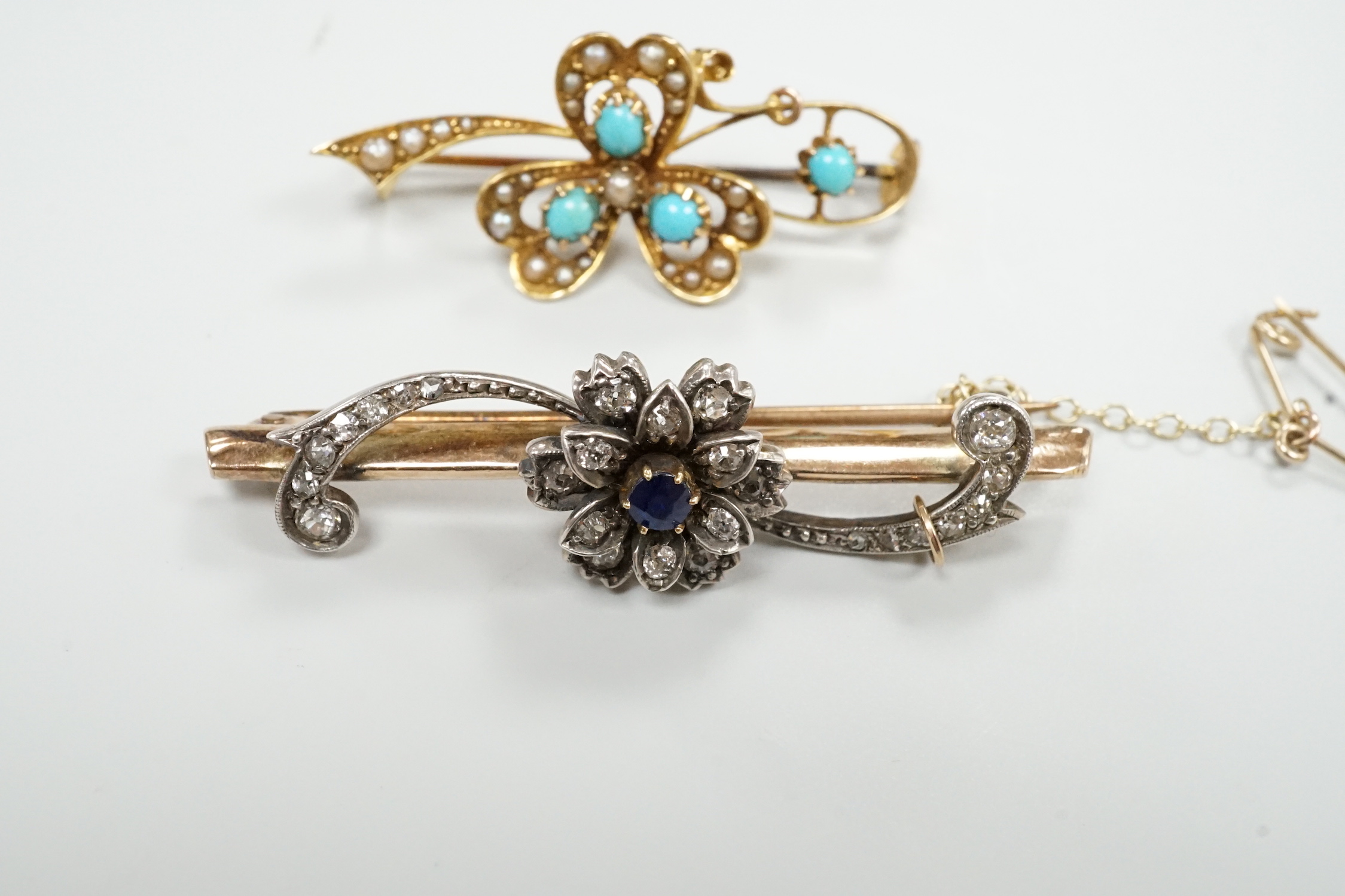 Two late Victorian yellow metal and gem set bar brooches, including sapphire and diamond, 46mm and turquoise and seed pearl, gross weight 9 grams.